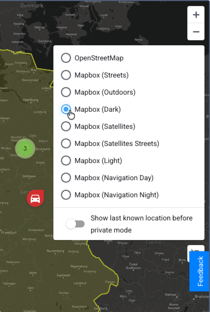 A settings menu overlaid on a map, with a cursor selecting the 'Mapbox (Dark)' radio button from a list of different map styles.