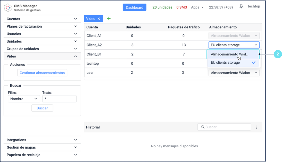 Proceso de desvinculación de un almacenamiento personalizado en el CMS Manager. En la pestaña 'Vídeo', una tabla muestra una lista de cuentas. Para la cuenta 'Client_B1', el usuario selecciona 'Almacenamiento de Wialon' en el menú desplegable de la columna 'Almacenamiento', para cambiar la selección anterior de 'EU clients storage'.
